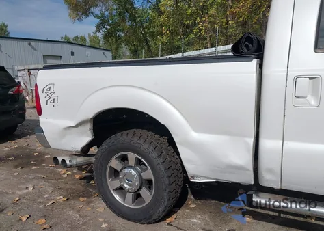 2011 Ford F-250 Lariat z USA, uszkodzony, nr VIN 1FT7W2BT4BEB87247